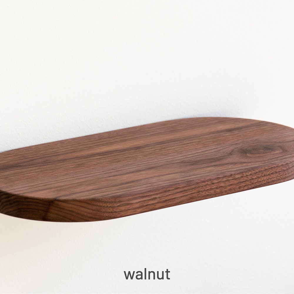 Shelf with a meaning: TWO SIDES, floating shelf made of oak or walnut