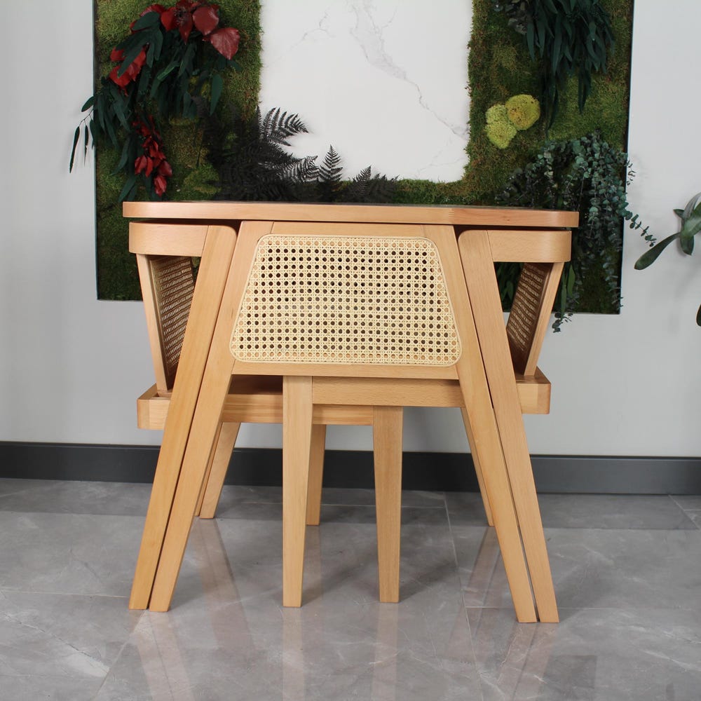3-piece table and chair set. Perfect for limited spaces with its wicker and interlocking structure.