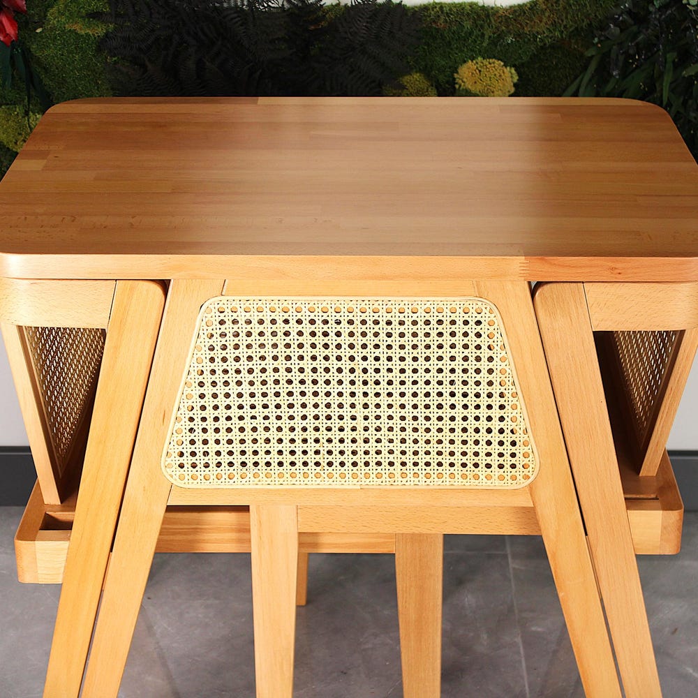 3-piece table and chair set. Perfect for limited spaces with its wicker and interlocking structure.