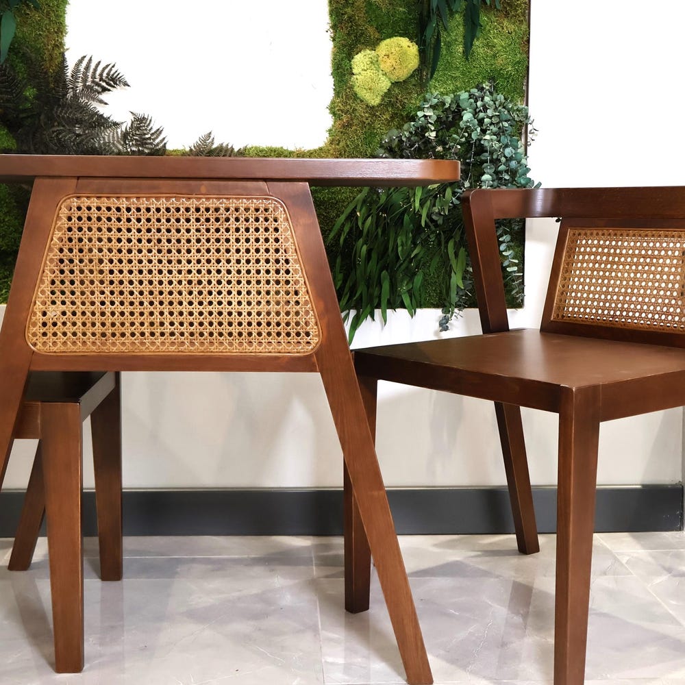 3-piece table and chair set. Perfect for limited spaces with its wicker and interlocking structure.
